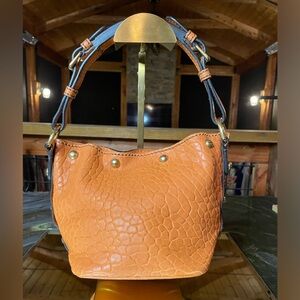 Christian Dior orange embossed leather handbag with pouch